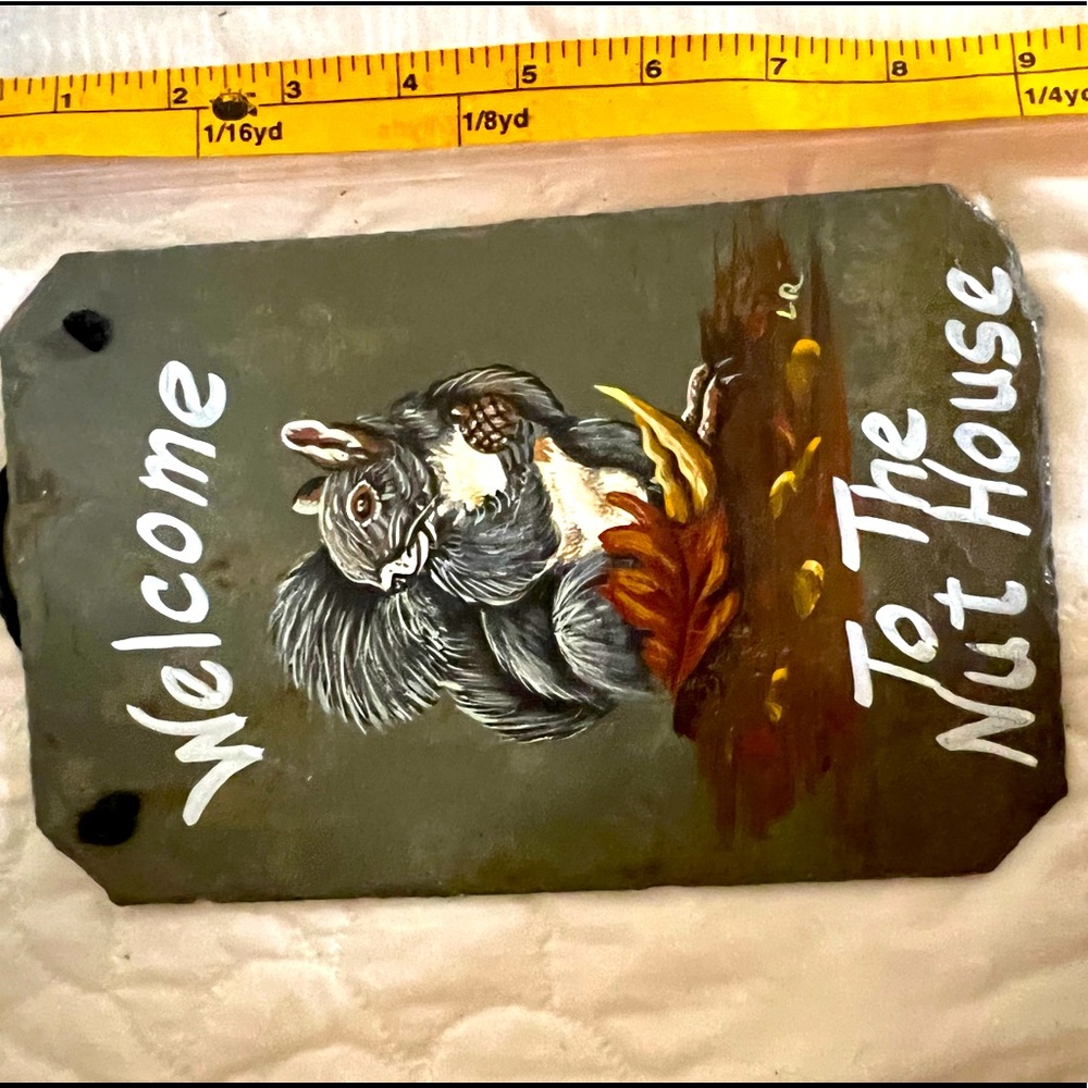 Welcome to the nuthouse slate hand painted sign. It’s heavy for its size.